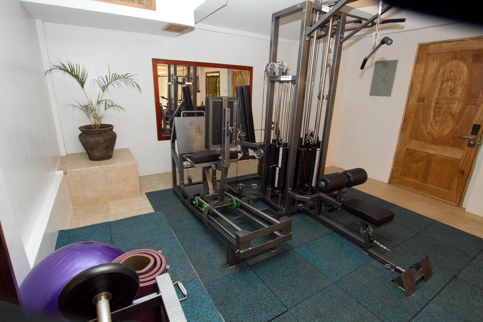 Ambassador In Paradise Balabag  Exterior foto A typical home gym